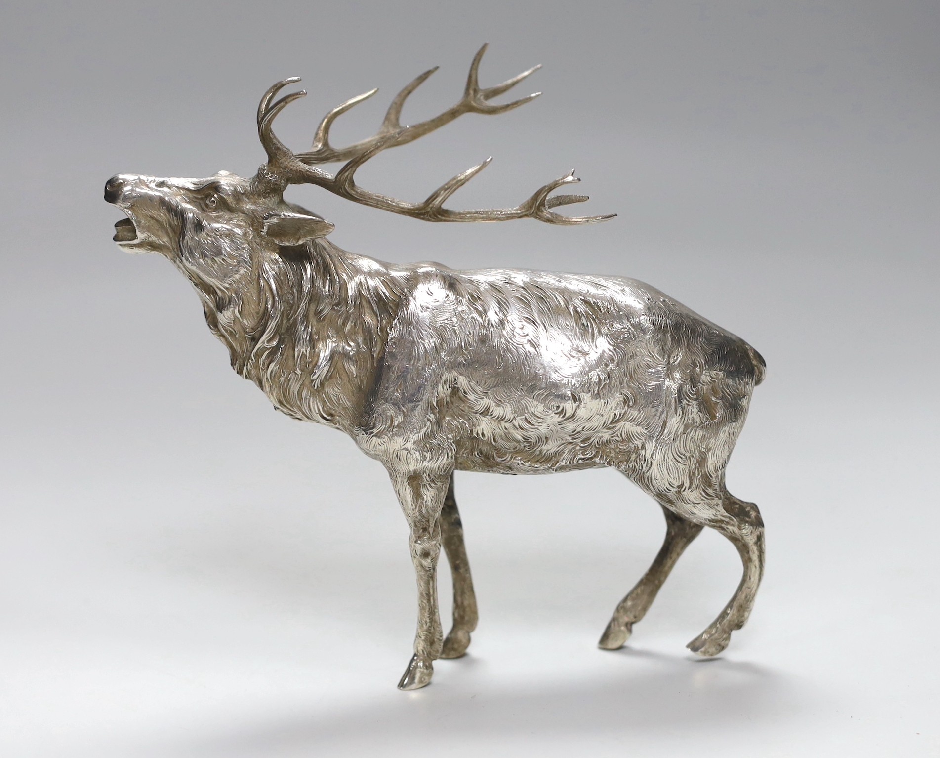 An 800 standard white metal free standing miniature model of a stag, height 18.3cm, 15.6oz.